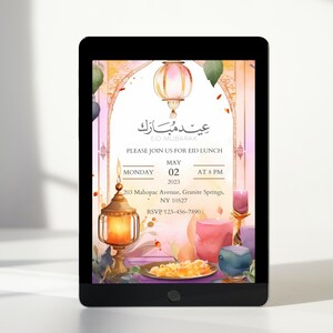 May include: An Eid Mubarak invitation with a watercolor background featuring a pink lantern, candles, and a plate of food. The invitation includes the date, time, and location of the event. RSVP information is also included.