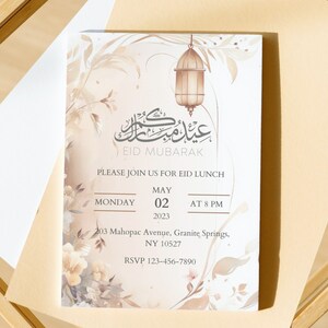 May include: A white invitation card with a floral design and a lantern. The card reads "Eid Mubarak" and includes details for an Eid lunch on Monday, May 02, 2023 at 8 PM. The address is 203 Mahopac Avenue, Granite Springs, NY 10527. The RSVP number is 123-456-7890.