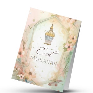 May include: A greeting card with a watercolor floral design featuring a gold lantern with a blue interior. The text "Eid Mubarak" is written in brown cursive lettering.