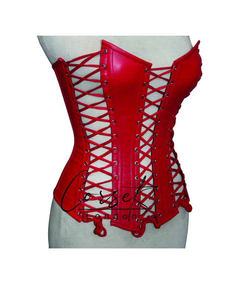A bright red strapless corset featuring a smooth finish and silver-toned metal eyelets with matching red lacing along the sides and front panels.