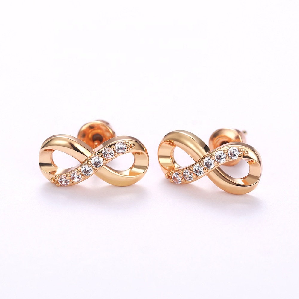 Stud earrings made of 585 yellow gold, bow knot in the shape of an infinity  symbol, clear zircons | Jewelry Eshop