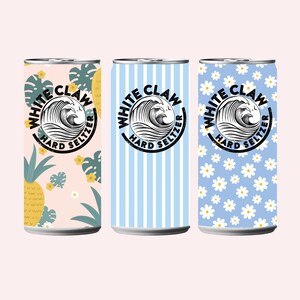 Puede incluir: Tres latas de White Claw Hard Seltzer. Las latas presentan diferentes dise&ntilde;os: una con fondo rosa e ilustraciones de pi&ntilde;as y hojas, otra con rayas verticales azules y otra con un estampado de margaritas azules. Cada lata tiene el logotipo de White Claw.