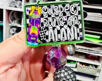 Glittered 'Suspect Runs on Alani' Badge Reel: Witches Brew Nurse ID Holder