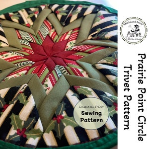 May include: A green, red, and white fabric trivet with a starburst pattern. The trivet is made from fabric scraps and is a great way to add a touch of handmade charm to your home. The trivet is labeled "Prairie Point Circle Trivet Pattern" and "Digital PDF Sewing Pattern".