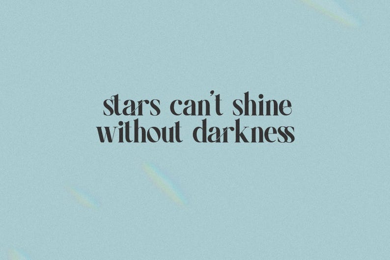 May include: A light blue background with the text "stars can't shine without darkness" in a serif font. The text is in black. The background has a subtle, textured appearance.