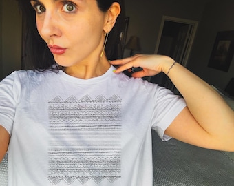 Tee/earrings set by Xandra the Creative