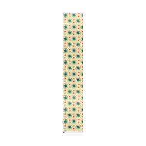 May include: A rectangular table runner with a repeating pattern of green starbursts and small red dots on a cream background. The runner is made of a soft, durable fabric.