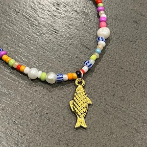 beaded fish charm necklace-beaded necklace with gold fish charm-fish charm necklace