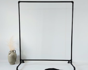 Rolling garment rack, pipe clothes rack, freestanding clothing racks, pipe shelving, clothes storage, retail display, pipe shelf, pipe rack