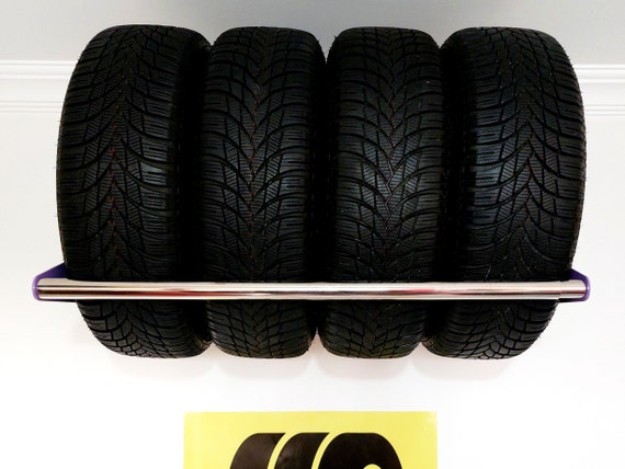 Wall mounted tyre rack deals