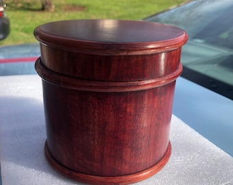 Gorgeous handmade round wooden box made out of cherry or rosewood , keepsake box