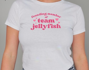 founding member of team jellyfish baby tee | the summer i turned pretty | white gildan 5000b | team conrad jeremiah cousins beach tsitp