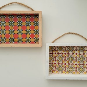 Athangudi tile painting on a wooden shadow box