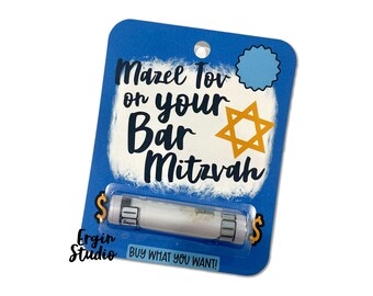 May include: Blue card with the text "Mazel Tov on your Bar Mitzvah" and a gold Star of David. A rolled-up dollar bill is visible in a plastic sleeve with the text "Buy what you want!"