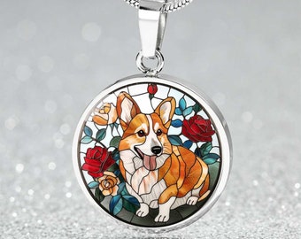 May include: A silver necklace with a round pendant featuring a stained glass design of a corgi dog with red, yellow, and blue flowers.