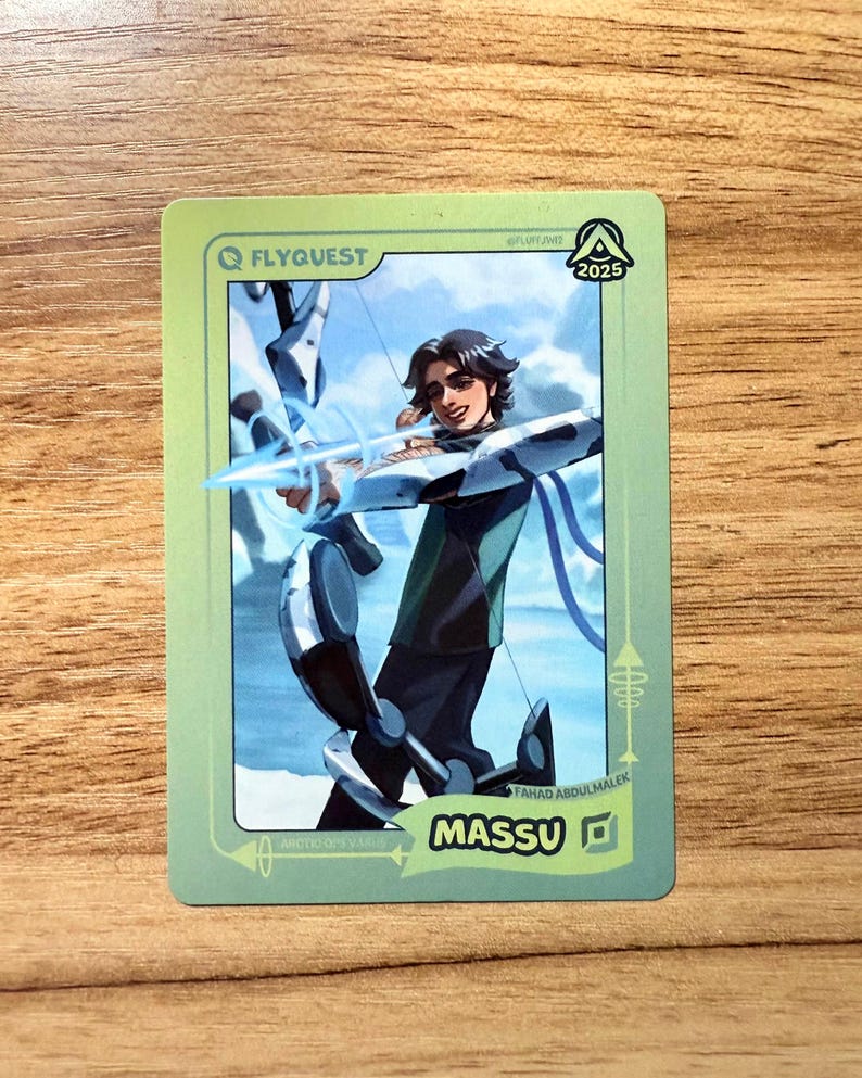 A trading card featuring lolesports LCS professional player Fahad Abdulmalek, aka Massu, in the FlyQuest 2025 green jersey. He is drawn aiming a bow as Arctic Ops Varus, one of his iconic League of Legends champions, in a bright arctic setting. The card has a green gradient border with the text "MASSU" and the Bot Lane ADC icon at the bottom right, 'ARCTIC OPS VARUS' at the bottom left, the LTA North logo and 2025 in the top right, and the FLYQUEST name and logo at the top left.