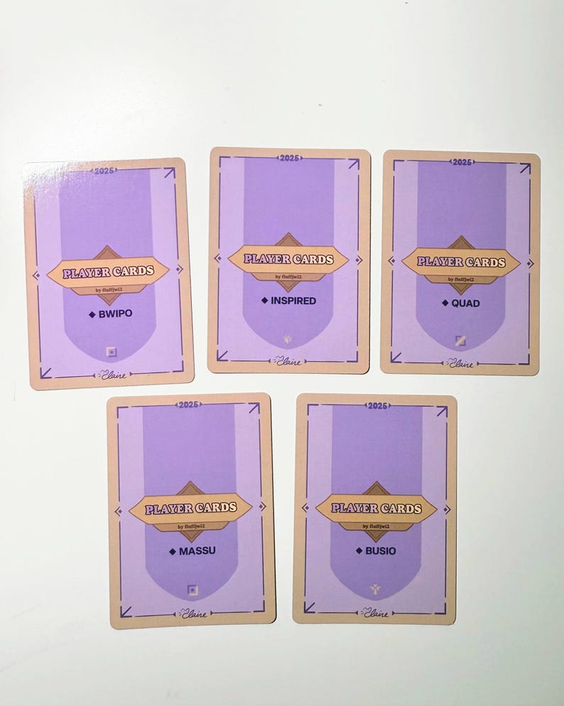 Back side of the five player cards with a light purple background and a golden border. Each card has the text "PLAYER CARDS" and the name of the respective FlyQuest 2025 player: BWIPO, INSPIRED, QUAD, MASSU, and BUSIO. The cards also have the year "2025" and the artist's signature.