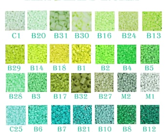 May include: A chart of 2.6 mm mini beads in various shades of green, yellow, and white. The beads are arranged in rows and columns, with each color labeled with a letter and number code. The text "MINI BEADS 2.6MM" is at the top of the chart.