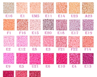 May include: A chart of 2.6 mm mini beads in various shades of pink, peach, and white. The beads are arranged in rows and columns, with each color labeled with a letter and number code. The chart is titled "MINI BEADS 2.6MM".