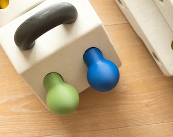 Two ball handles with adjustable holding force for MODU®