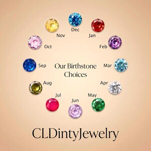 May include: A circular arrangement of twelve round faceted gemstones in various colors, labeled with months from Jan to Dec. The text reads Our Birthstone Choices and CLDintyJewelry. The stones include red, purple, light blue, white, green, pink, yellow, and dark blue.