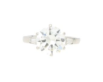 Platinum 3.24ct diamond ring with tapered baguette shoulders