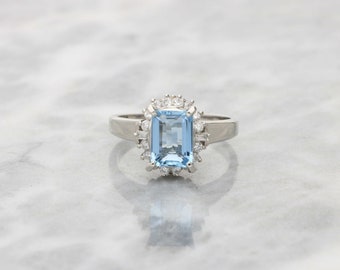 Platinum aquamarine and diamond cluster ring