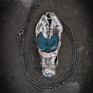 Månmosshare: rent silverpläterat kaninhuvud Mossagat Måne 8,1g, Onyxögon 6,5ct, subtil lågblixt Månsten 2,5ct