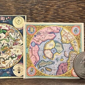 May include: Three antique maps, each depicting a different part of the world. The first map is a black and white map of the Arctic region, the second map is a colorful map of the constellations, and the third map is a colorful map of the Southern Hemisphere.