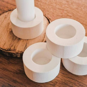 simple white candle holders - stick candle holders