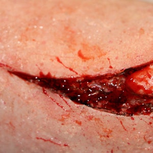 Latex Skin Flap Wound. Prosthetic Appliance. Skin Flap. Halloween. Film TV Theatre Prosthetics. Cosplay. SFX Make-Up. Cut. Deep Cut.
