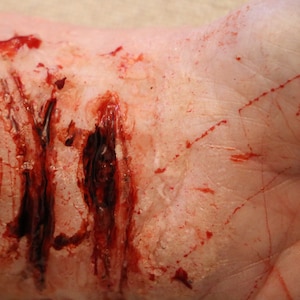 Latex Slit Wrist Wound. Prosthetic Appliance for Film, TV and Theatre. Slashed Wrist Prosthetic. SFX Make-Up Cut. Deep Cut. Halloween SFX.