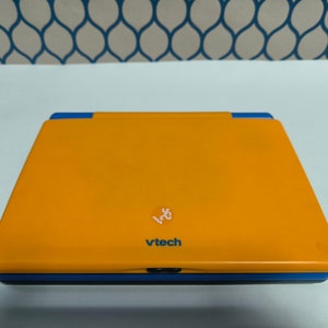 Laptop Computadora Infantil Educativa Vtech NaranjA en Español