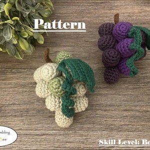 May include: Crochet pattern for a beginner level project. The pattern includes instructions for making two bunches of grapes, one green and one purple.
