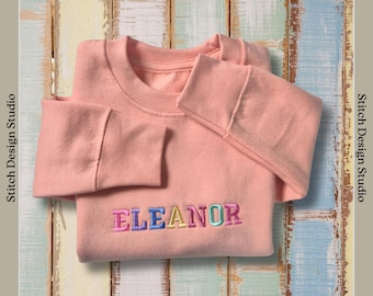 Embroidered children's name sweatshirt. Personalised rainbow name jumper