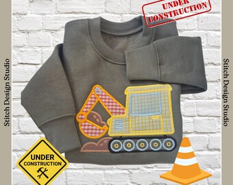 Children's embroidered digger sweatshirt. Personalised with name. Little builder's birthday gift.