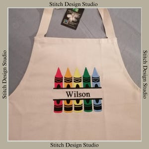 Embroidered Kids Apron for Art, Craft, and Cooking Adventures, personalised with a name.