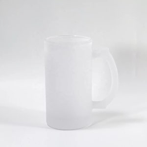 May include: A frosted glass beer mug with a handle. The mug is white and opaque.