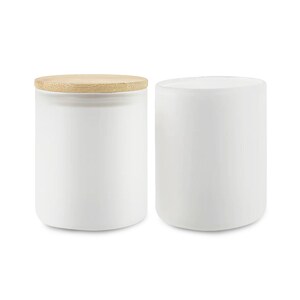 May include: Two white ceramic jars with lids. One jar has a wooden lid. Both jars are empty.
