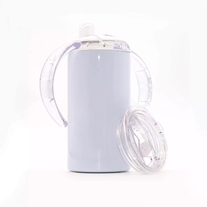 May include: White stainless steel tumbler with two clear plastic handles and a clear plastic lid. The lid has a straw hole.