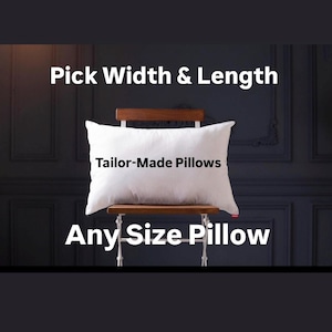 Può includere: Un cuscino bianco su una sedia di legno con il testo "Tailor-Made Pillows" e "Any Size Pillow".