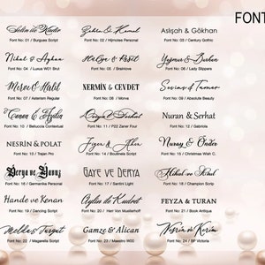 May include: A chart with a list of fonts and names written in each font. The chart is on a pink background with white pearls scattered around the edges.