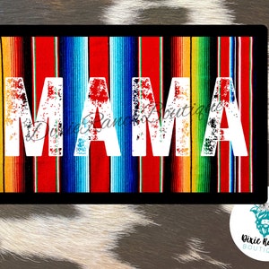 May include: White text that reads "MAMA" on a colorful striped background. The stripes are red, orange, yellow, green, blue, and white. The background is black.