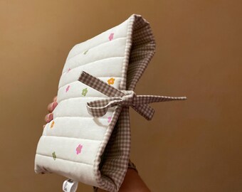 Soporte acolchado para libros