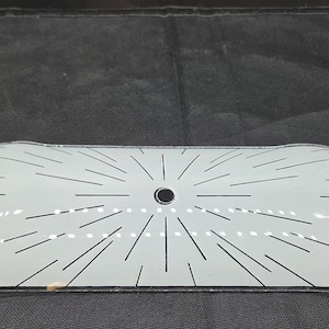 May include: A rustic wooden sign with the text "Welcome to our home" in white lettering. The sign features a distressed finish and a simple, inviting design, perfect for entryway decor.