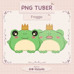May include: Two cartoon frogs wearing gold crowns. The frogs are green with light green spots and a cream-colored belly. The image has the text "PNG TUBER" and "Froggo". The image is on a light pink background with decorative floral elements.