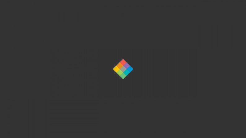 May include: A colorful diamond-shaped design with a gradient of red, orange, yellow, green, blue, and purple.