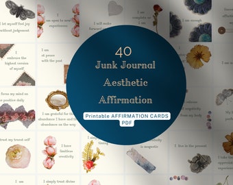 May include: A set of 40 printable affirmation cards with a blue background and white text. The cards feature various images, including flowers, butterflies, and crystals. The text on the cards includes positive affirmations such as "I am complete as I am" and "I am grateful for the abundance I have and the abundance on the way."