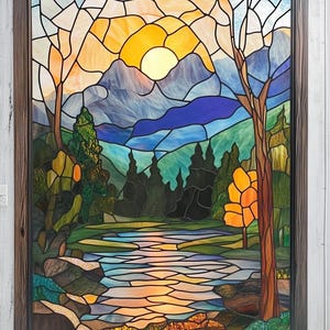 May include: A stained glass window depicting a sunset over a mountain range with a river flowing through a forest. The sun is a bright yellow circle in the sky, and the mountains are a mix of blue, purple, and green. The river is a light blue colour, and the forest is a dark green.