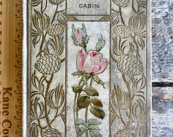 Schöne rosa Rose und Tannenzapfen Decke! Original antike (c. 1899) Henry Altemus Ausgabe von „Uncle Tom’s Cabin“ von Harriet Beecher Stowe